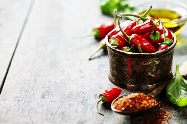 chili peppers with herbs and spices