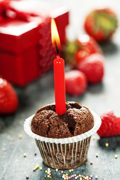 Chocolade muffin met kaars — Stockfoto