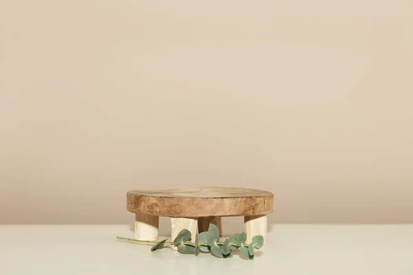 Empty Wooden Podium Product Presentation Eucalyptus Leaves Beige Background Abstract — Fotografia de Stock