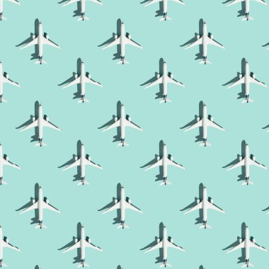 Mavi arka planda beyaz yolcu uçağıyla yapılmış yaratıcı bir kompozisyon. Yaz seyahati ya da tatil düzeni. Düz konum, kare bileşim