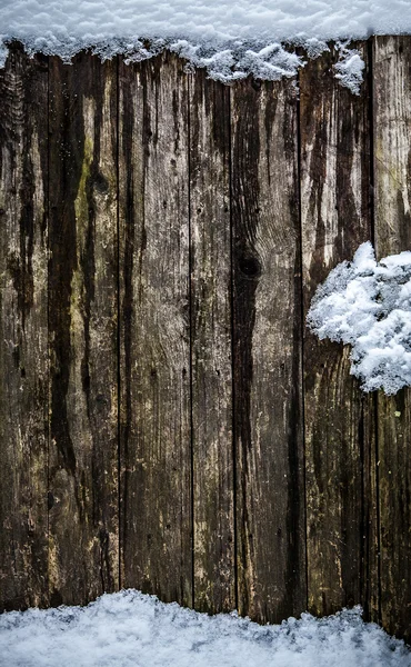 Houten hek in de sneeuw — Stockfoto