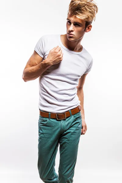 Attractive man wearing T-shirt close up portrait on white background. — Stock Photo, Image