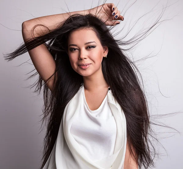 Beautiful woman posing in studio — Stock Photo, Image