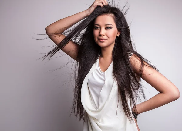 Beautiful woman posing in studio — Stock Photo, Image