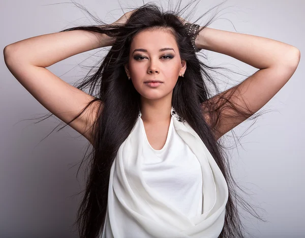 Beautiful woman posing in studio — Stock Photo, Image