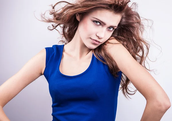 Cute young woman in elegant blue dress — Stock Photo, Image