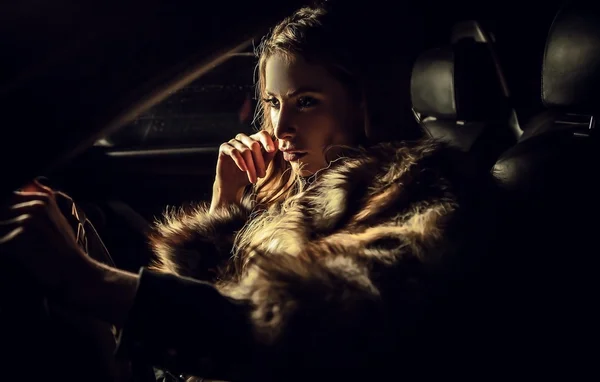 Luxury woman in a car. — Stock Photo, Image