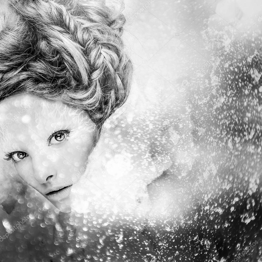 Romantic beauty with magnificent hair wandering in clouds. Digital painted black-white portrait of women face.