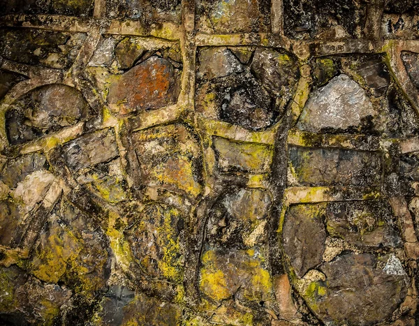 Grunge colored background of old stone wall texture. — Stock Photo, Image