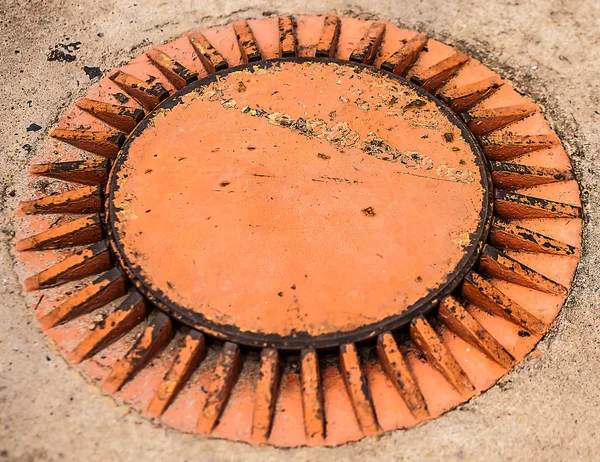 Hatch on gas station. Grunge metal texture. — Stock Photo, Image