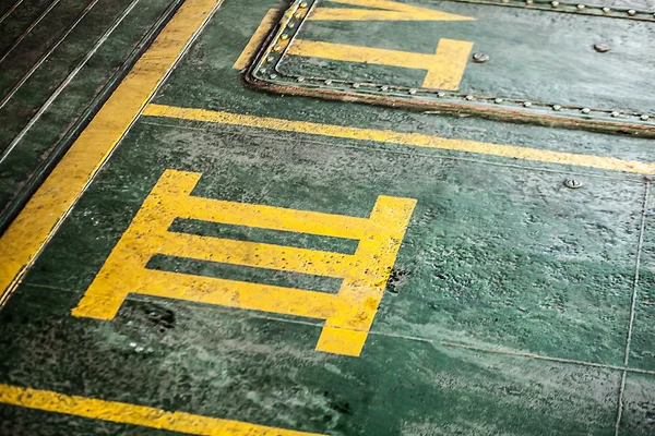 Yellow marking on old ferry boat as background. — Stock Photo, Image