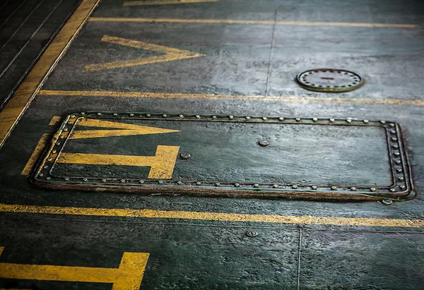 Yellow marking on old ferry boat as background. — Stock Photo, Image