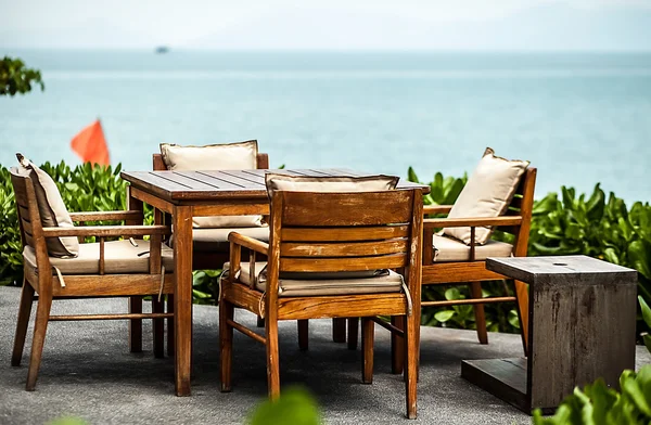 Καφέ στην παραλία με τροπικό νησί - διακοπές φόντο — Φωτογραφία Αρχείου