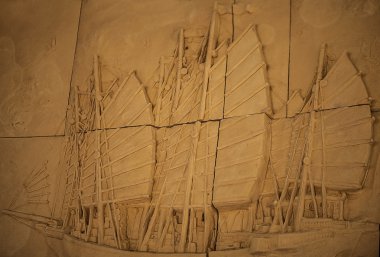 Geleneksel Asya görüntü taştan bir duvar üzerinde kesme..