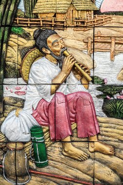 Geleneksel Asya görüntü taştan bir duvar üzerinde kesme..