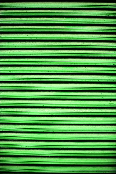 Old colored green shutters background — Stock Photo, Image