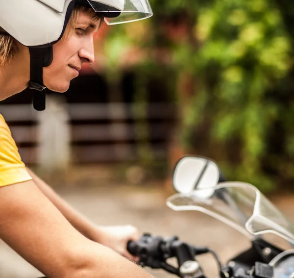 Driving a scooter — Stock Photo, Image