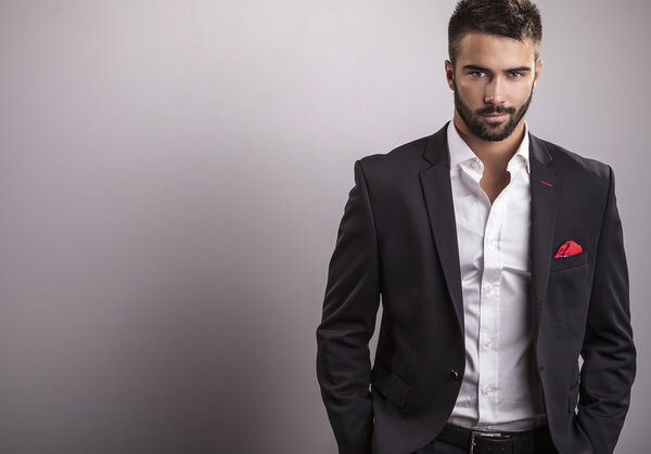 Elegant young handsome man. Studio fashion portrait.