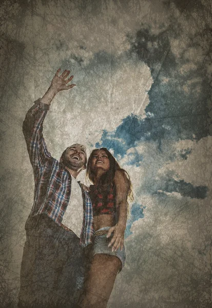 Retro styled grunge portrait of young positive couple. — Stock Photo, Image