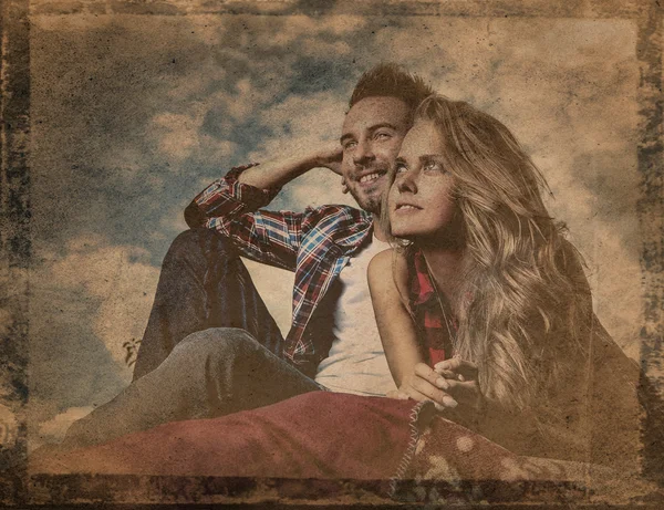 Retro styled grunge portrait of young positive couple. — Stock Photo, Image