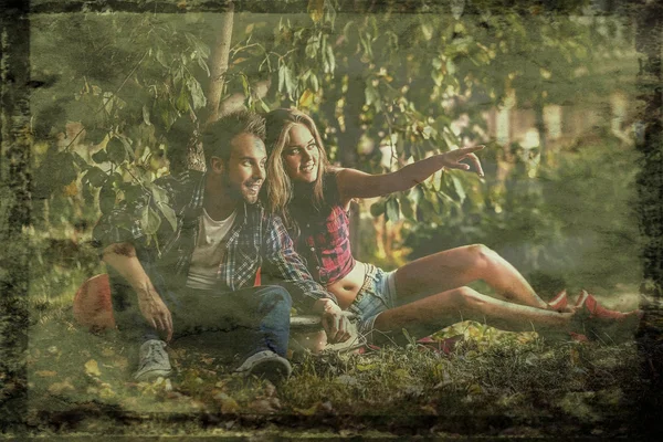 Retro styled grunge portrait of young positive couple. — Stock Photo, Image