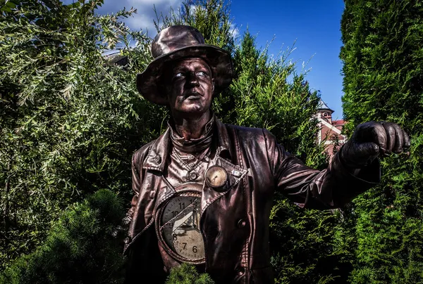 Immagine di orologiaio in brillante stilizzazione fantasia. Outdoor fiaba foto d'arte . — Foto Stock