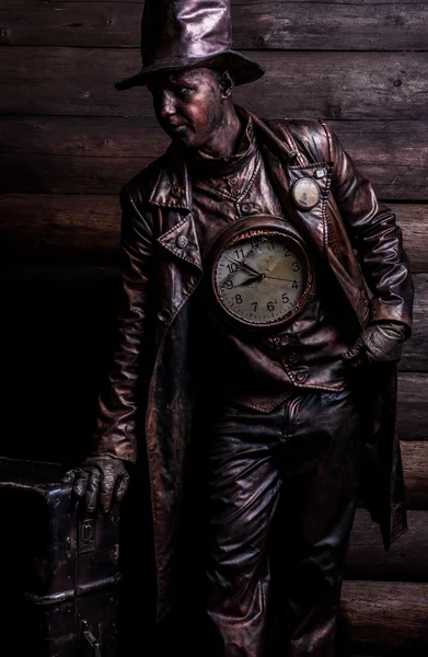 Image of watchmaker in bright fantasy stylization. Fairy tale art photo on grunge wooden background. — Stock Photo, Image