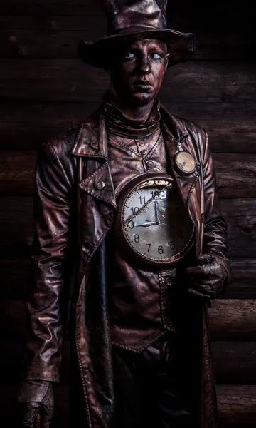 Image of watchmaker in bright fantasy stylization. Fairy tale art photo on grunge wooden background. — Stock Photo, Image
