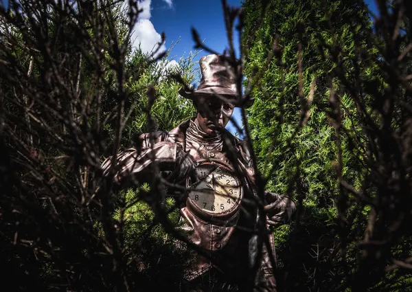 Imagen de relojero en brillante estilización de fantasía. Foto de arte cuento de hadas al aire libre . —  Fotos de Stock