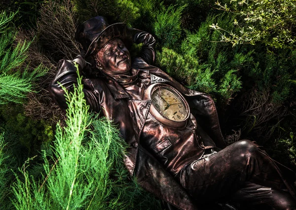 Image of watchmaker in bright fantasy stylization. Outdoor fairy tale art photo. — Stock Photo, Image