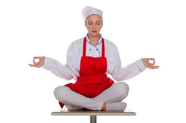 Cook in a red apron — Stock Photo, Image