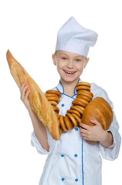 Laughing baker with bread and bagels — Stock Photo, Image