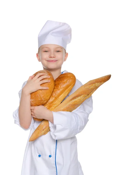 Panadero sonriente con pan —  Fotos de Stock