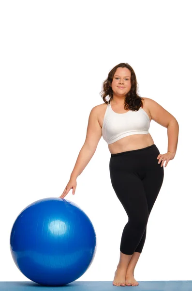Tlustá žena s míčem — Stock fotografie