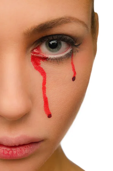 Blood flows from the eye of a beautiful woman — Stock Photo, Image