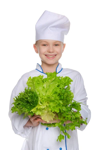 Cocinero risueño con hierbas frescas — Foto de Stock