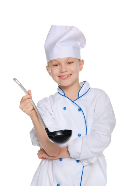 Sonriente joven chef con cucharón —  Fotos de Stock