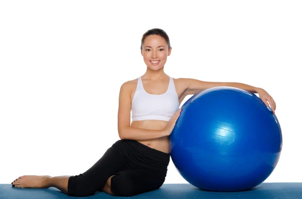 Asian sits with blue ball — Stock Photo, Image