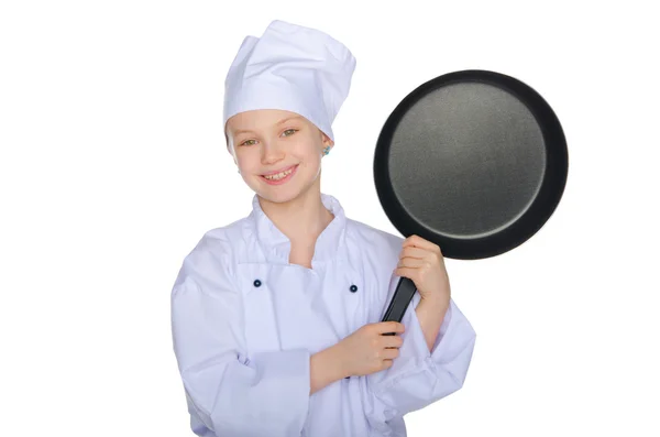 Jonge lachende kok met een pan — Stockfoto