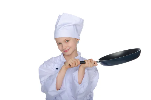 Молодой повар с сковородкой — стоковое фото