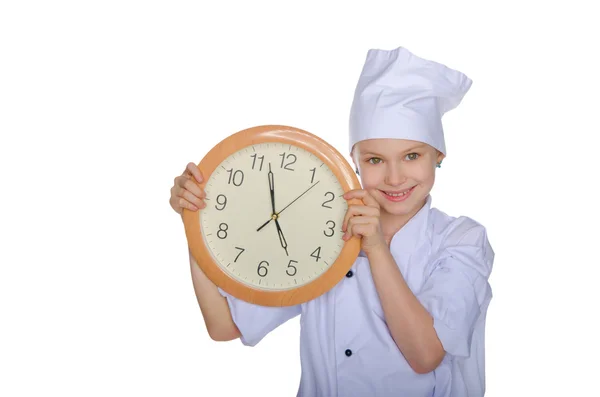 Young chef with clock Stock Image