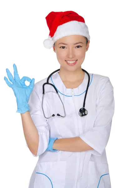 Médecin avec stéthoscope approuve Noël — Photo