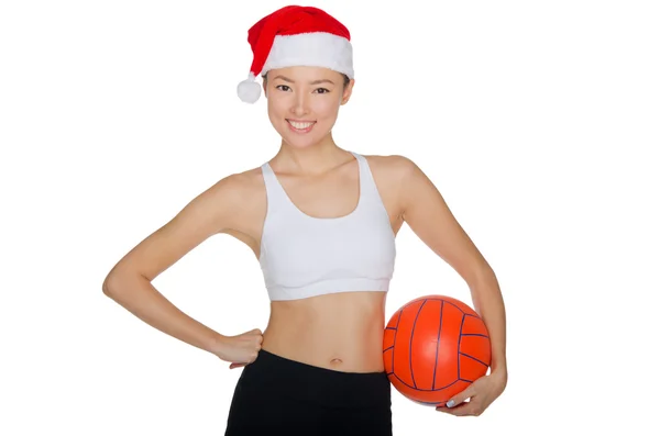 Asian with a ball in the hat of Santa Claus — Stock Photo, Image
