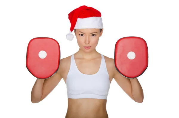 Woman protects herself in Santa Claus hat — Stock Photo, Image