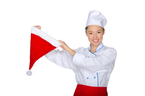 Asijské kuchařka s čepici santa Claus — Stock fotografie