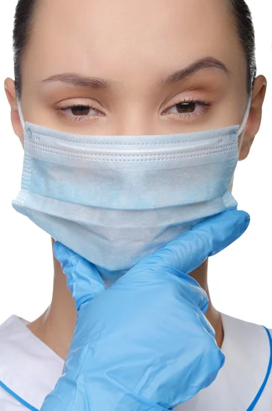 Jonge dokter in een masker — Stockfoto