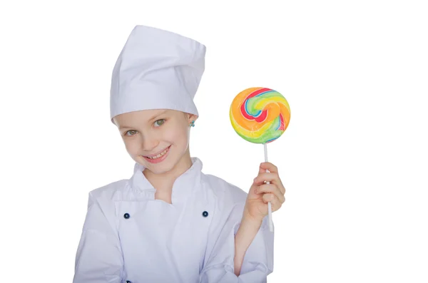 女孩厨师用棒棒糖 — 图库照片