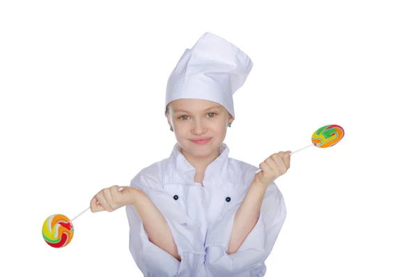 Jeune chef avec des bonbons colorés — Photo