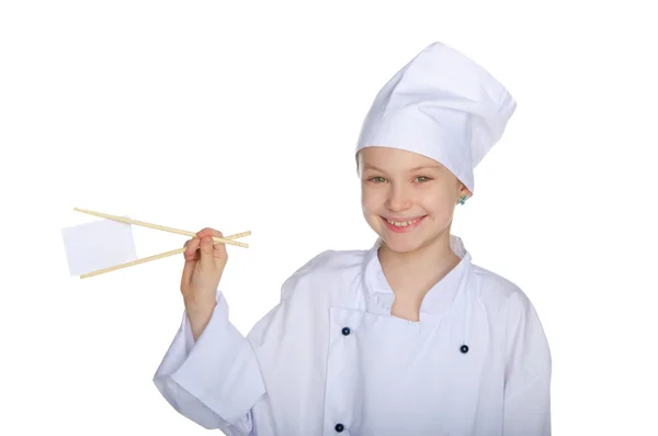 Chef sosteniendo palillos página en blanco — Foto de Stock