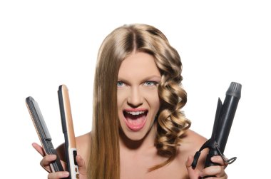 Young woman keeps hair curlers and rectifier clipart